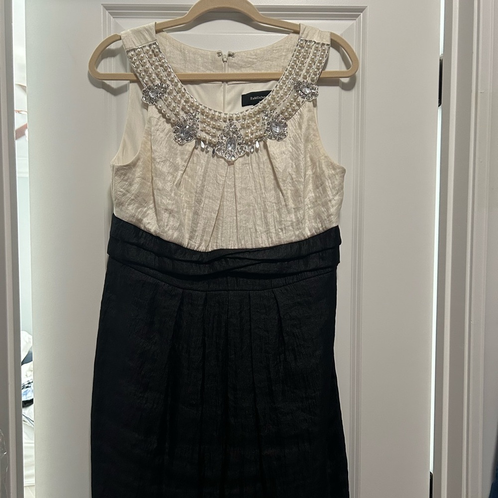 Black and cream sleeveless dress worn for 30s themed party